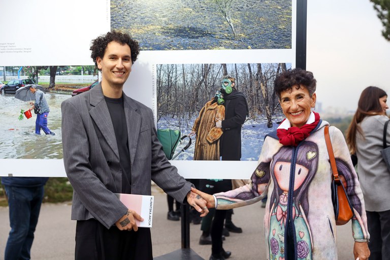 Two participants of the “Climate Action Through Poetry and Photography” exhibition at the opening event.